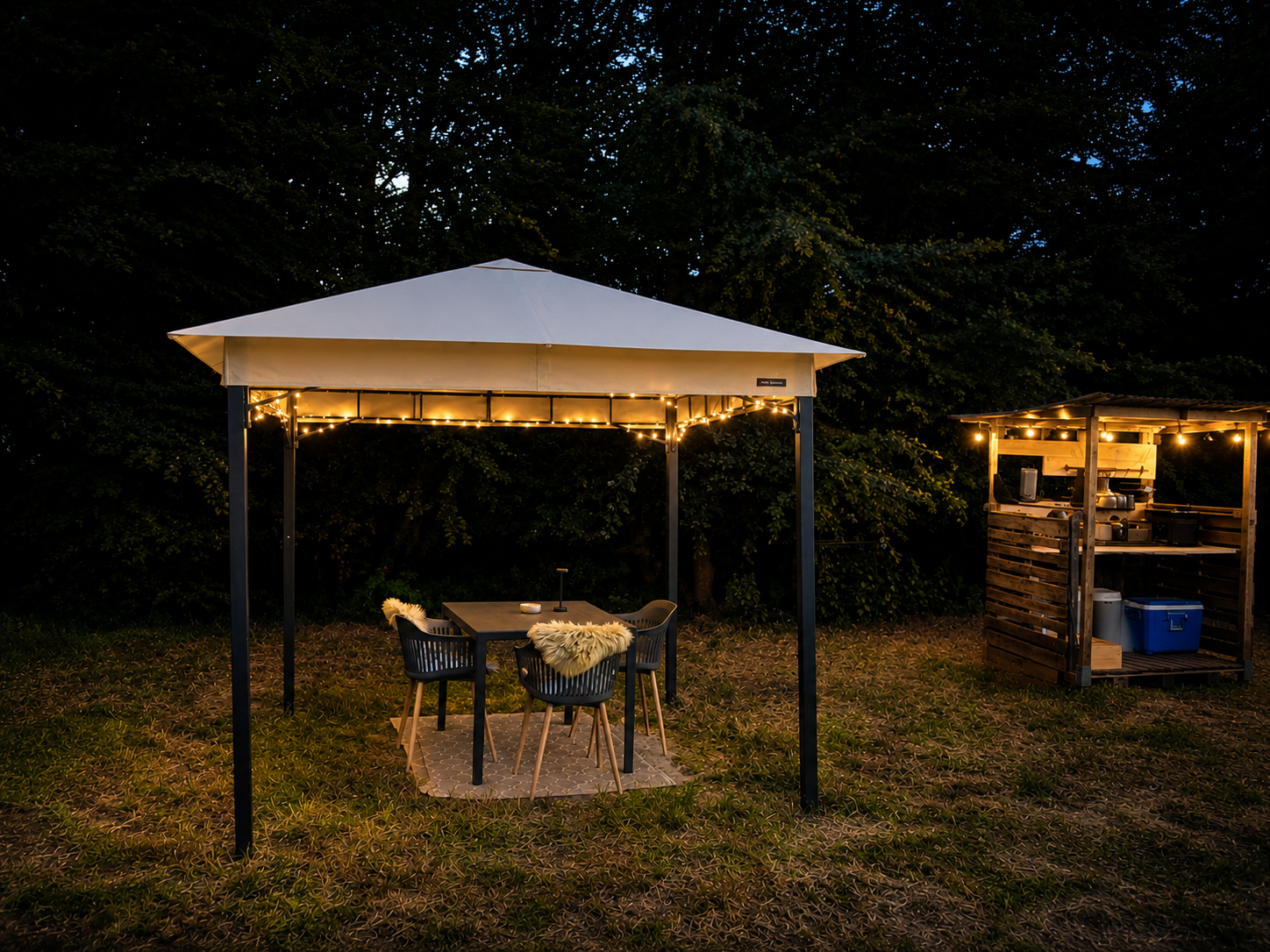 Sheltered outdoor lounge beside a forest glamping tent